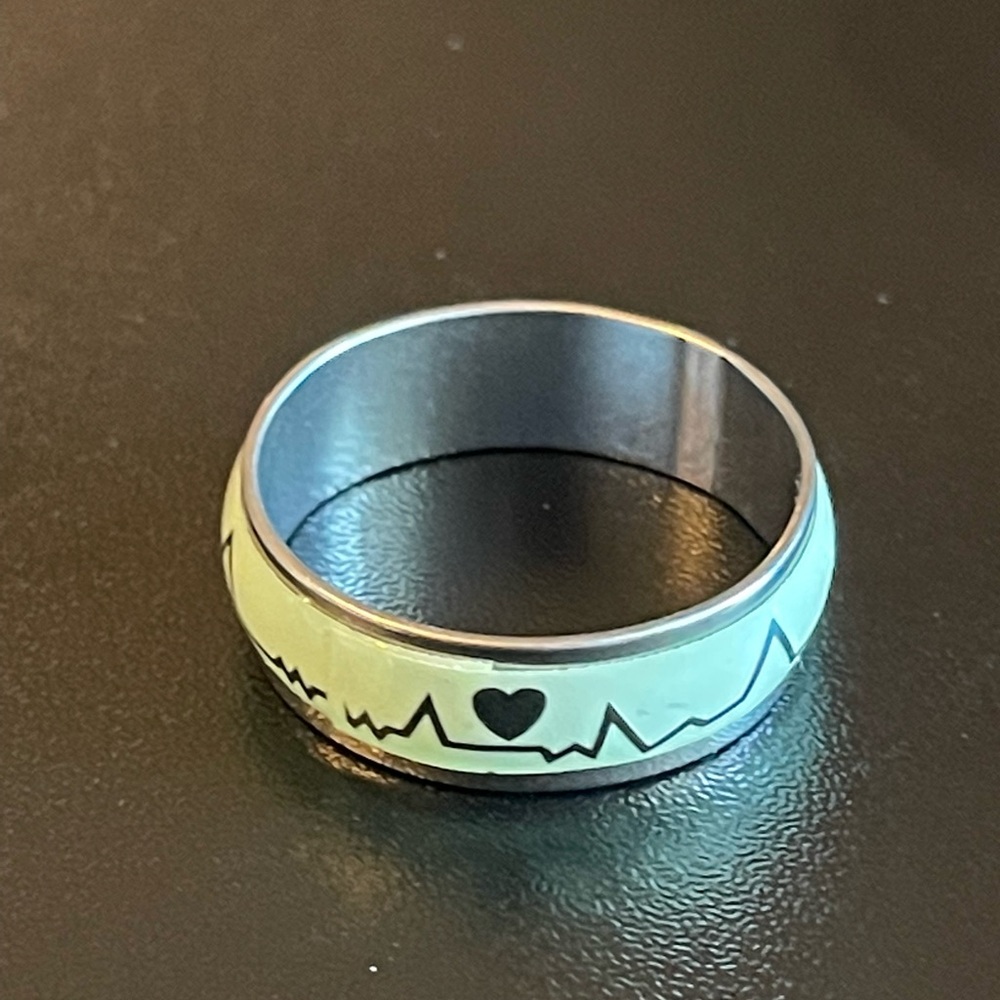 Glow in the dark heartbeat ring